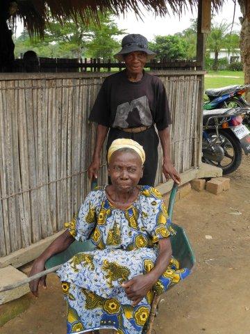 Papa Jerome used to use the wheelbarrow to take Mama Hélène everywhere. This is them arriving at our eye centre