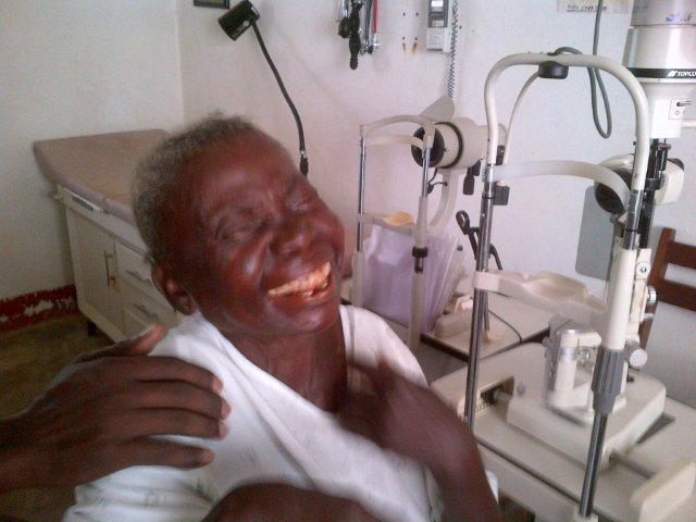 A laughing Mama Hélène as she received the Priceless Gift of Sight 3